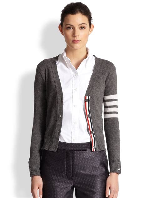 Presented in quality cotton, this cardigan will stand the test of time. . Thom browne cardigan